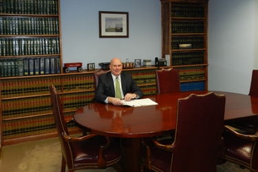 Mark Nolan sitting in conference room